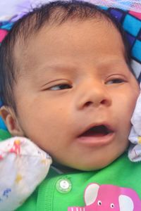 Close-up portrait of cute baby girl