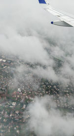 Aerial view of city against sky