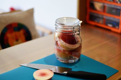 Glass of drink on table