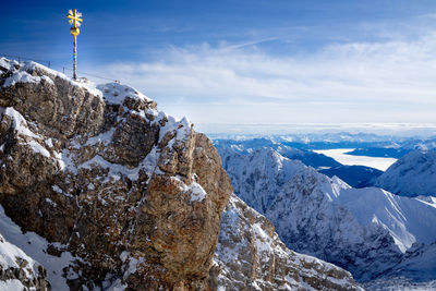 Scenic view of snowcapped mountains against sky