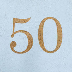 Close-up of number on wall