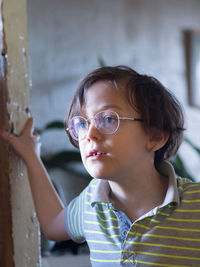 Portrait of cute boy looking away