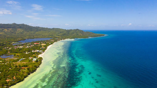 Beautiful tropical beach and turquoise water view from above. bohol, anda, philippines. 