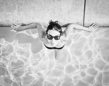 High angle view of man swimming in pool