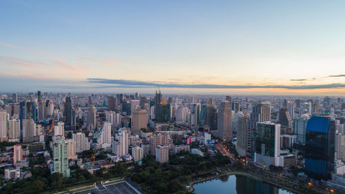 High angle view of buildings against sky during sunset