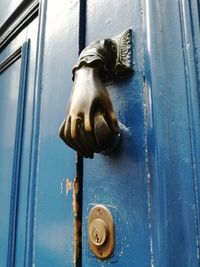 Close-up of closed door knocker