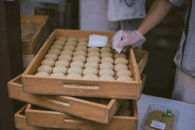 Close-up of man working in bakery