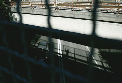 Reflection of bridge on river in city