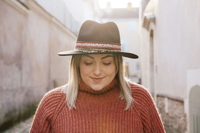 Young woman wearing hat