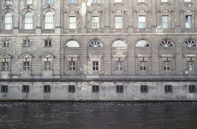 View of building with reflection in water
