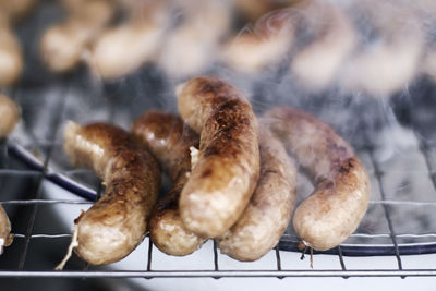 Close-up of meat on barbecue grill