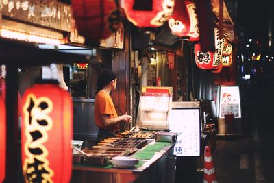 View of market stall at night