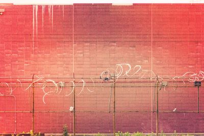 Text on brick wall