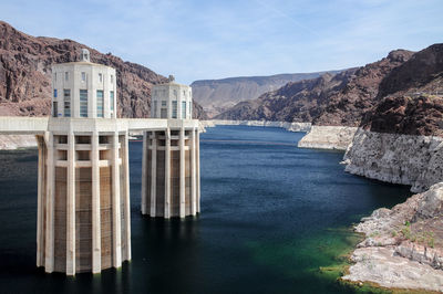 View of the pen stock towers over lake mead at hoover dam, between arizona and nevada states, usa.