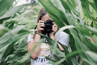 Portrait of man photographing