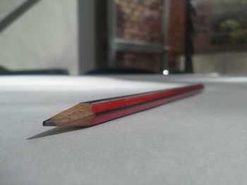 Close-up of pencil on floor