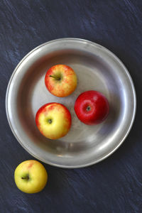 High angle view of apples in bowl on table