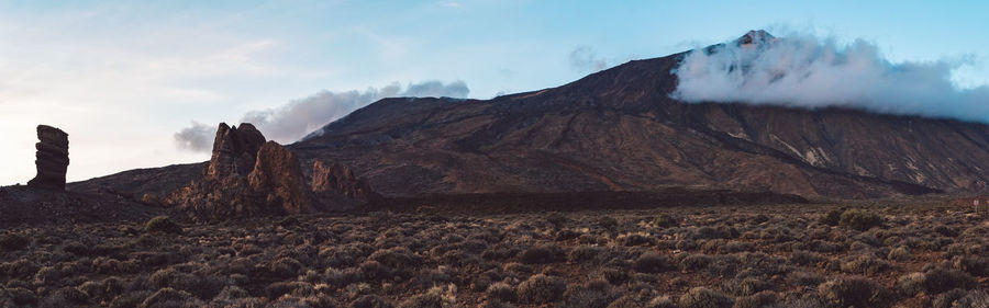 Panoramic view of landscape and mountains against sky