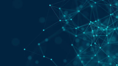 Abstract image of illuminated lights against black background