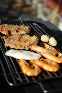 High angle view of meat in cooking pan