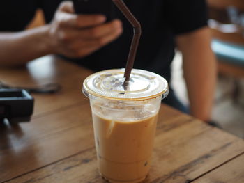 Close-up of coffee cup on table