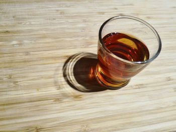 Close-up of wine on wooden table