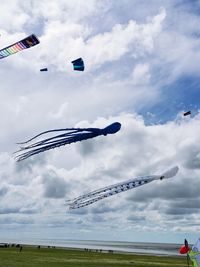 Low angle view of airplane flying in sky