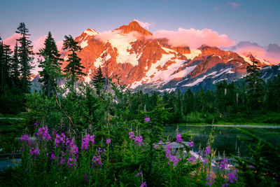 Scenic view of lake against mountain range