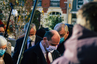 Group of people in front of city