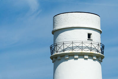 Low angle view of water tower against sky