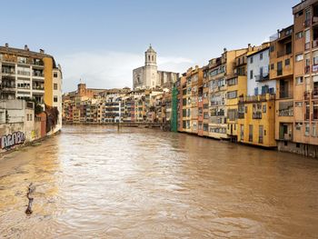 Canal passing through city buildings