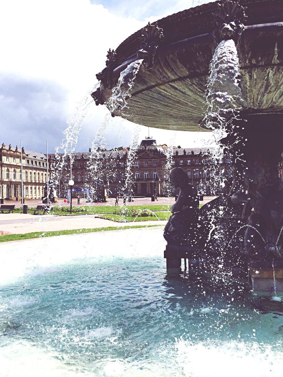 building exterior, built structure, architecture, sky, water, fountain, cloud - sky, art and craft, art, sculpture, statue, day, outdoors, creativity, human representation, cloud, weather, reflection, wet, animal representation