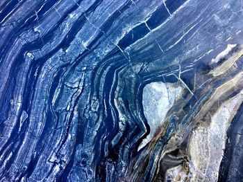 Full frame shot of icicles on rocks