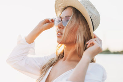 Portrait of woman wearing hat