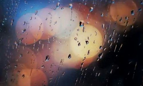 Full frame shot of raindrops on glass window