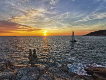 Scenic view of sea against sky during sunset