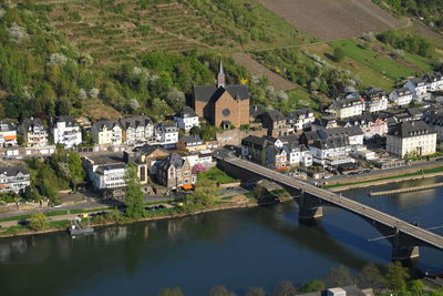 High angle view of river amidst buildings in town