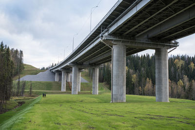 Built structure on field against sky