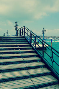 Pier on sea against sky