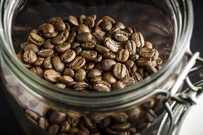 High angle view of coffee beans in jar