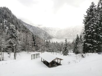 Scenic view of snow to lake of hallstat 