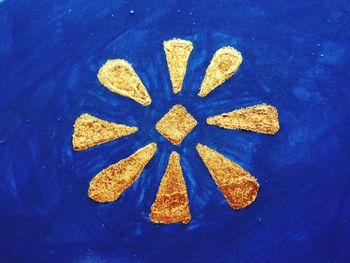 High angle view of bread on table against blue background