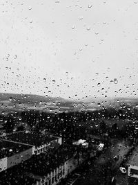 Full frame shot of raindrops on glass window