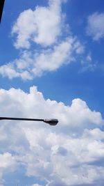 Low angle view of street light against sky