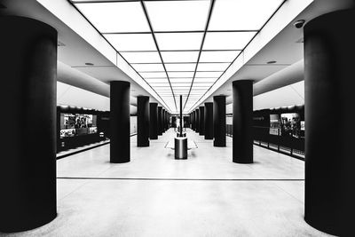 Empty railroad station platform in building