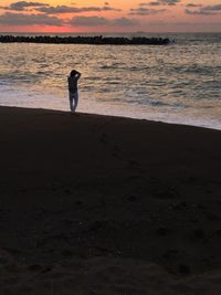 Scenic view of sea at sunset