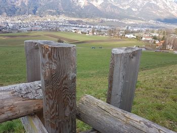 Scenic view of field seen through fence