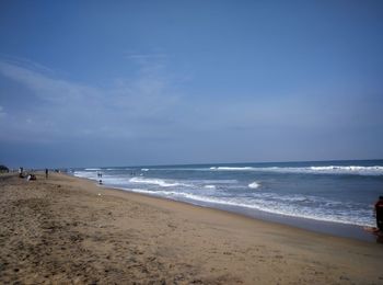 View of beach against blue sky