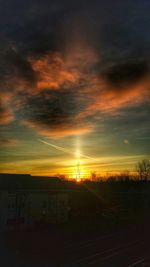 Scenic view of landscape against sky during sunset