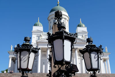 Low angle view of building against clear blue sky